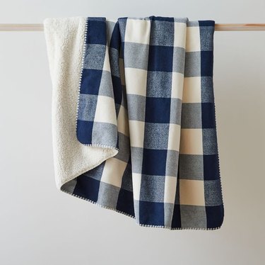 blue and white plaid throw with sherpa lining