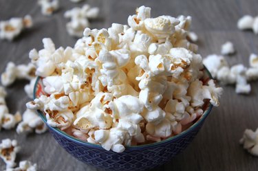 popcorn in blue ceramic bowl