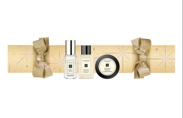 gold christmas cracker with three body products