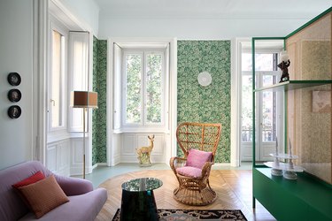 living room with green floral wallpaper