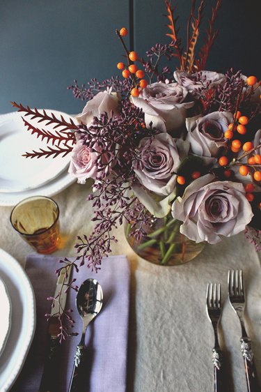plum and amber table setting and centerpiece
