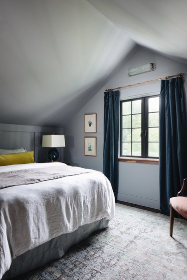 vintage bedroom velvet drapery panels at window