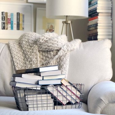 Pile of books in metal basket