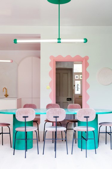 '80s themed dining room with wavy line around doorway