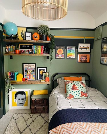 Children's bedroom with a twin bed and colorful book shelves