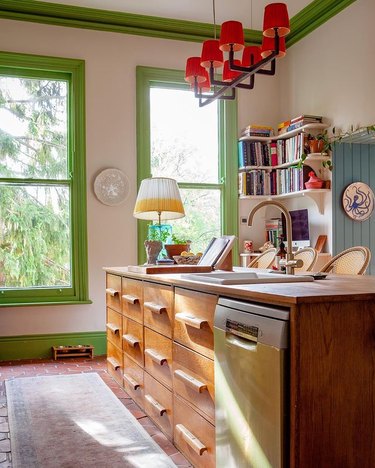 Rustic kitchen with bookshelves on the wall