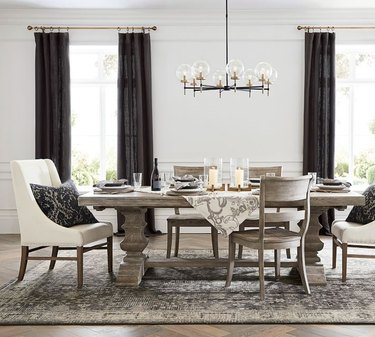dark patterned rug in traditional dining room