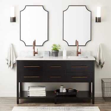 modern bathroom vanity with brass pulls