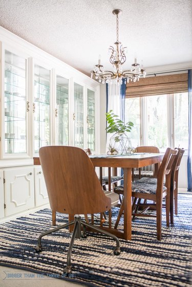 Roman shades and curtains in dining room
