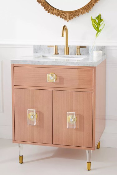 blush bathroom vanity with Lucite details