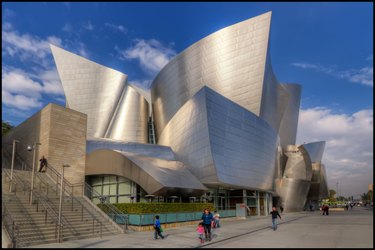 Shiny metal building with pointy peaks