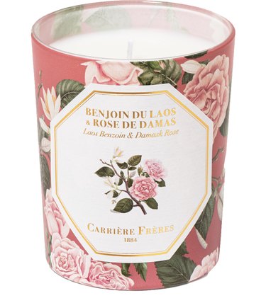 candle in pink floral container