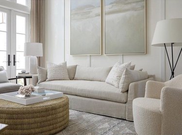 cream living room wall color with gray area rug