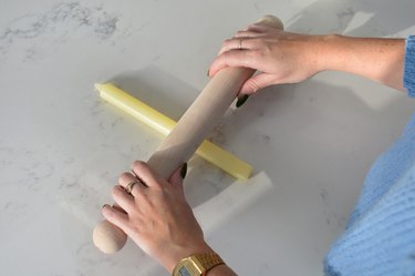 Rolling candle flat with rolling pin