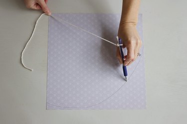 Tracing an arc shape on piece of cardstock