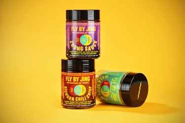 three jars of Fly By Jing spice sauces