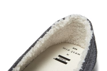 Close-up of the inside sole of the West Elm x TOMS collaboration label in a slipper