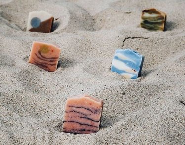 wato soap in sand on beach