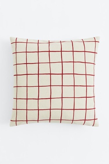 A red and white checked throw pillow.