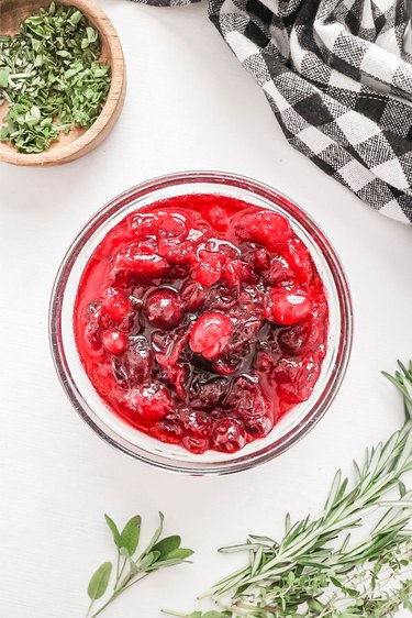 Cranberry sauce in a bowl on a white background