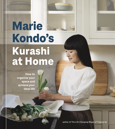 The "Marie Kondo’s Kurashi at Home" book cover, which shows Marie arranging white tulips in a vase.