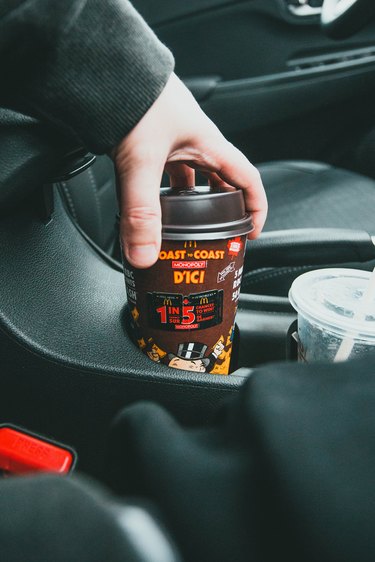 Coffee cup in a cup holder