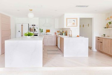two-tone kitchen color idea with pink and white cabinetry
