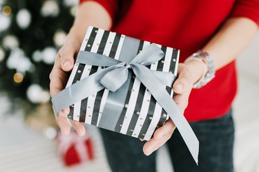 Gift wrapped in black and white striped paper