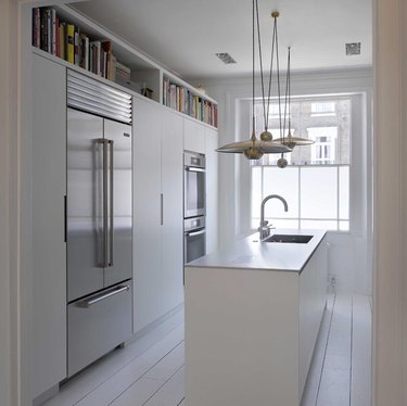 modern, slim kitchen with cabinet shelf for cook books