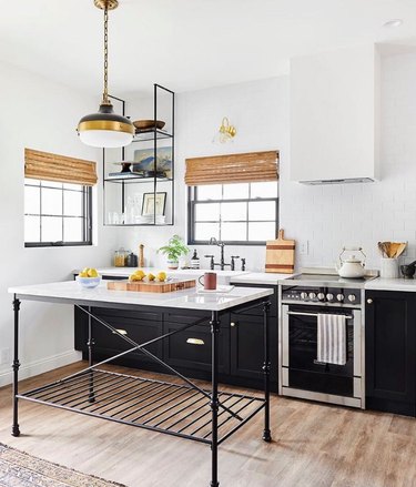 Table kitchen island with black legs and marble top