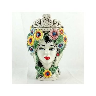 A multicolored ceramic head figurine with flowers