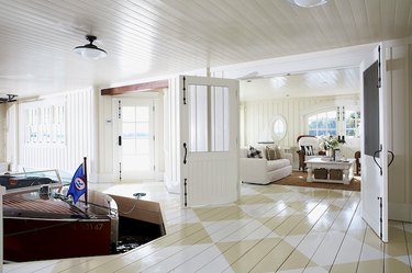 white living room with harlequin print painted floors