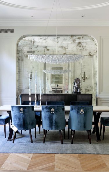 elegant dining room with antique mirror
