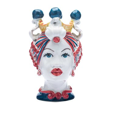 A ceramic head figurine with a crown