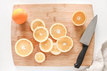 Orange slices on a cutting board