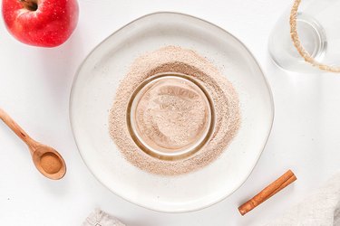 Dip rim of glass into cinnamon sugar