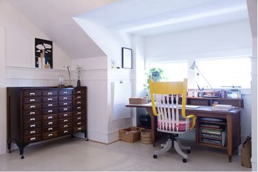 home office with desk and yellow chair with Home Office Storage Ideas
