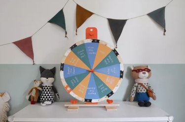 Spinning wheel, stuffed animals.