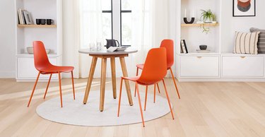 orange dining chairs in modern kitchen