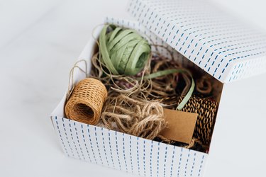 Ribbons and cords in a box