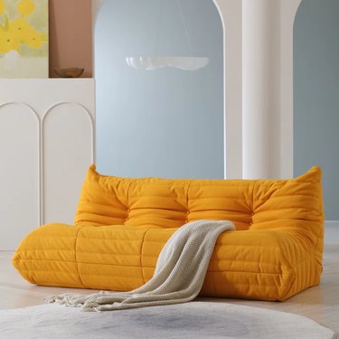 yellow togo-style sofa