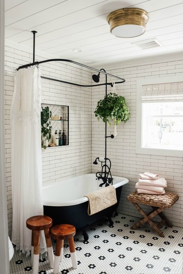 Bathroom with towels on chair.
