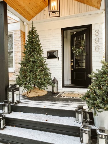 winter front porch with faux Christmas tree