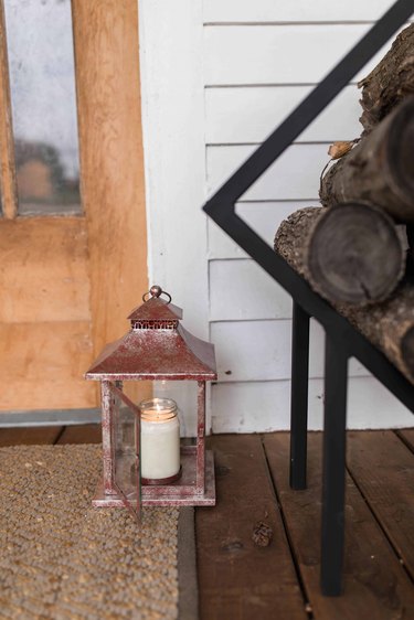 winter front porch with lantern