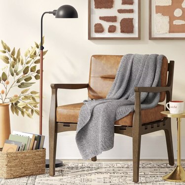 gray blanket draped on chair