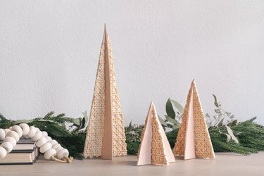 DIY balsa wood christmas trees with cane webbing and leather