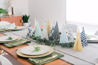 Patterned paper as forest of trees on table
