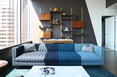 living room with large shelving unit for apartment decorating ideas