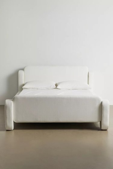 padded white bed frame