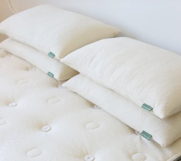 organic pillows on bed